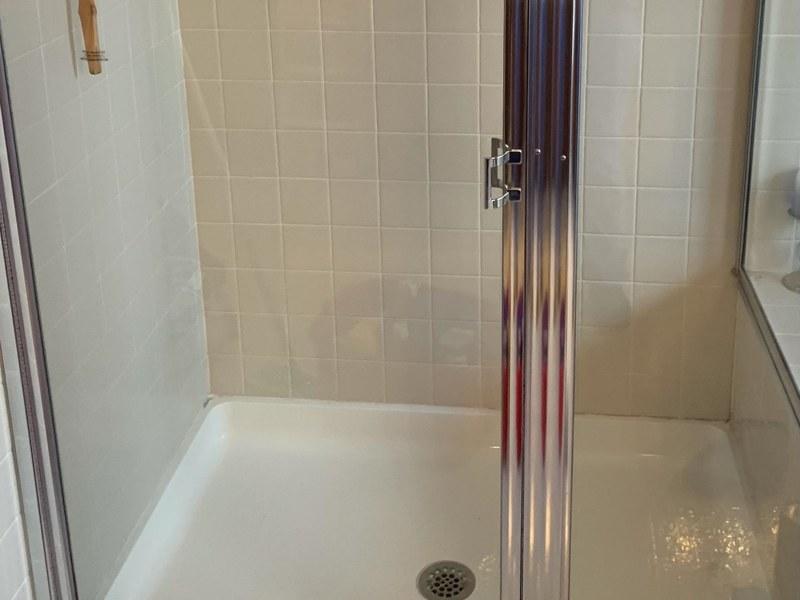 After — Shower glass sparkling clean